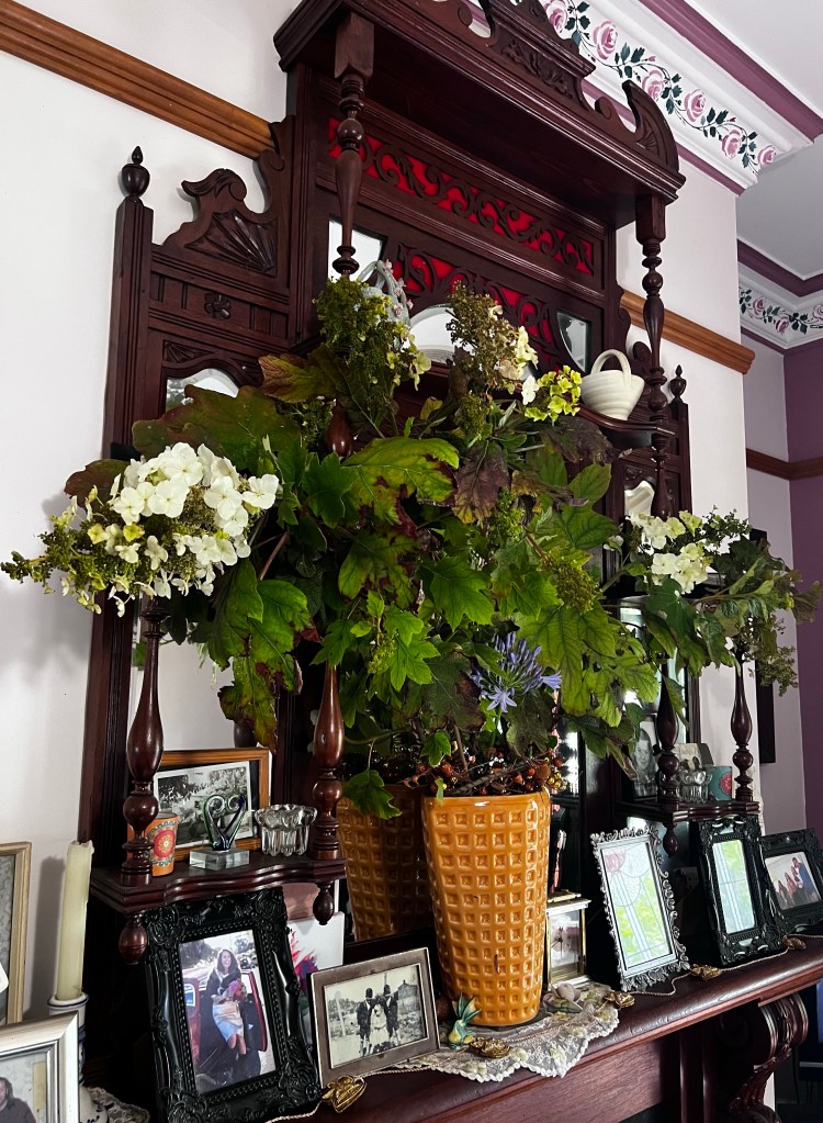 Floral arrangement on a mantelpiece 