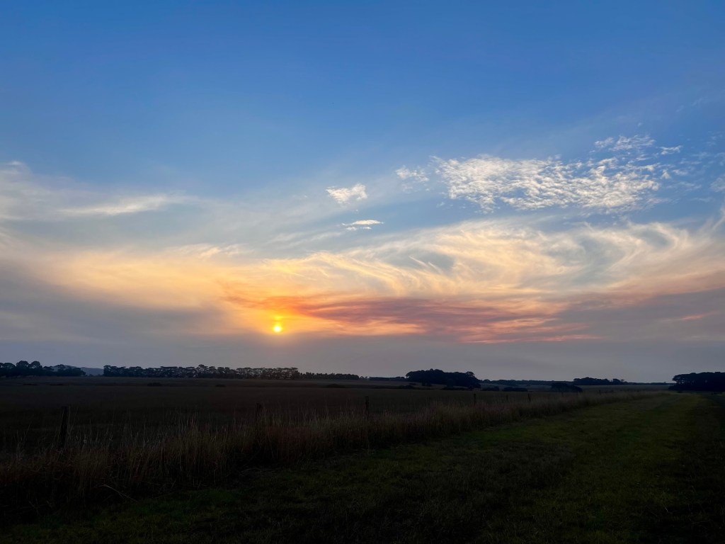 An image of a beautiful cloud formation at sunset on the volcanic plains of Victoria